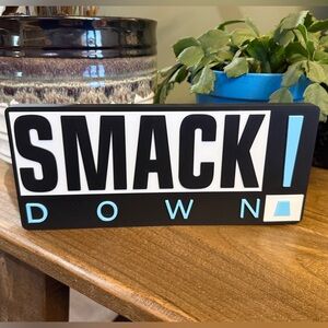 Smackdown WWE Wall Plaque: Vintage Wrestling Decor for Man Cave